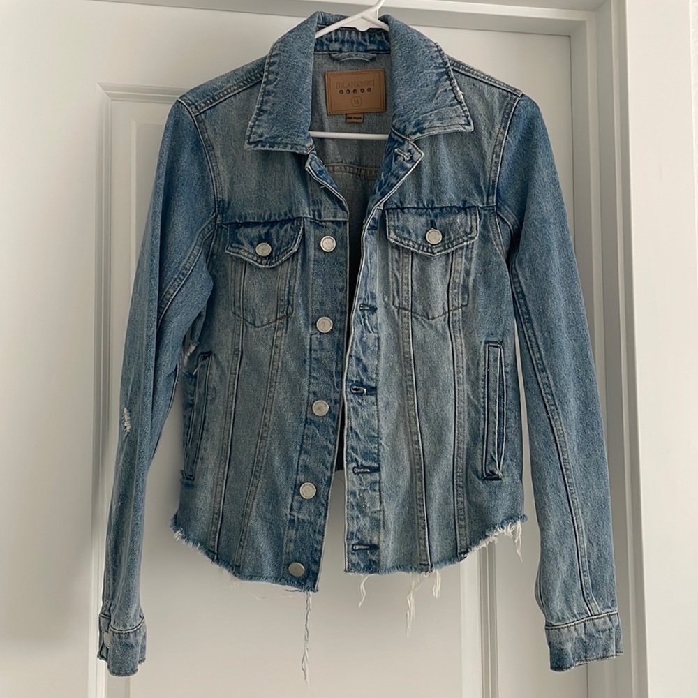 Distressed women’s jean jacket